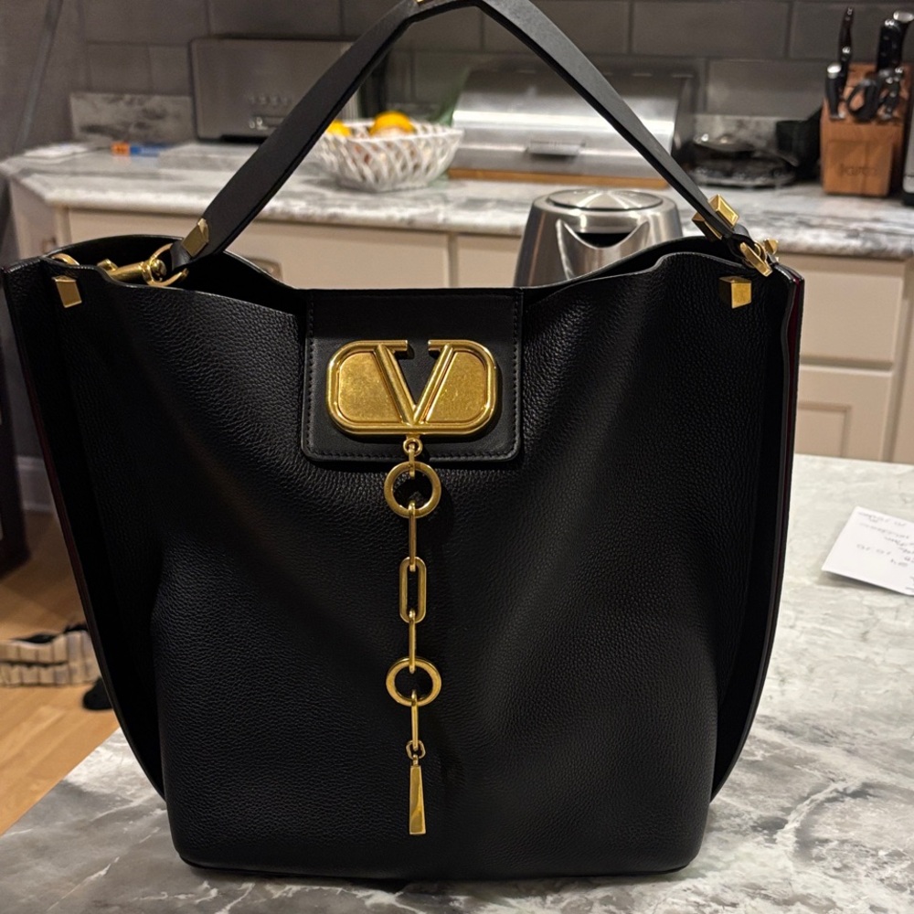 Valentino Garavani Black Bag with Gold Accents